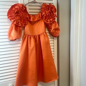 Gorgeous orange ballroom style dress . Girls size 10-12